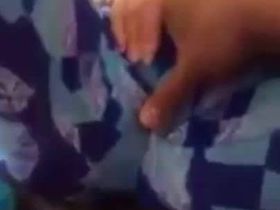 Пацан мастурбирует клитор через штаны свое сестре и снимает на камеру